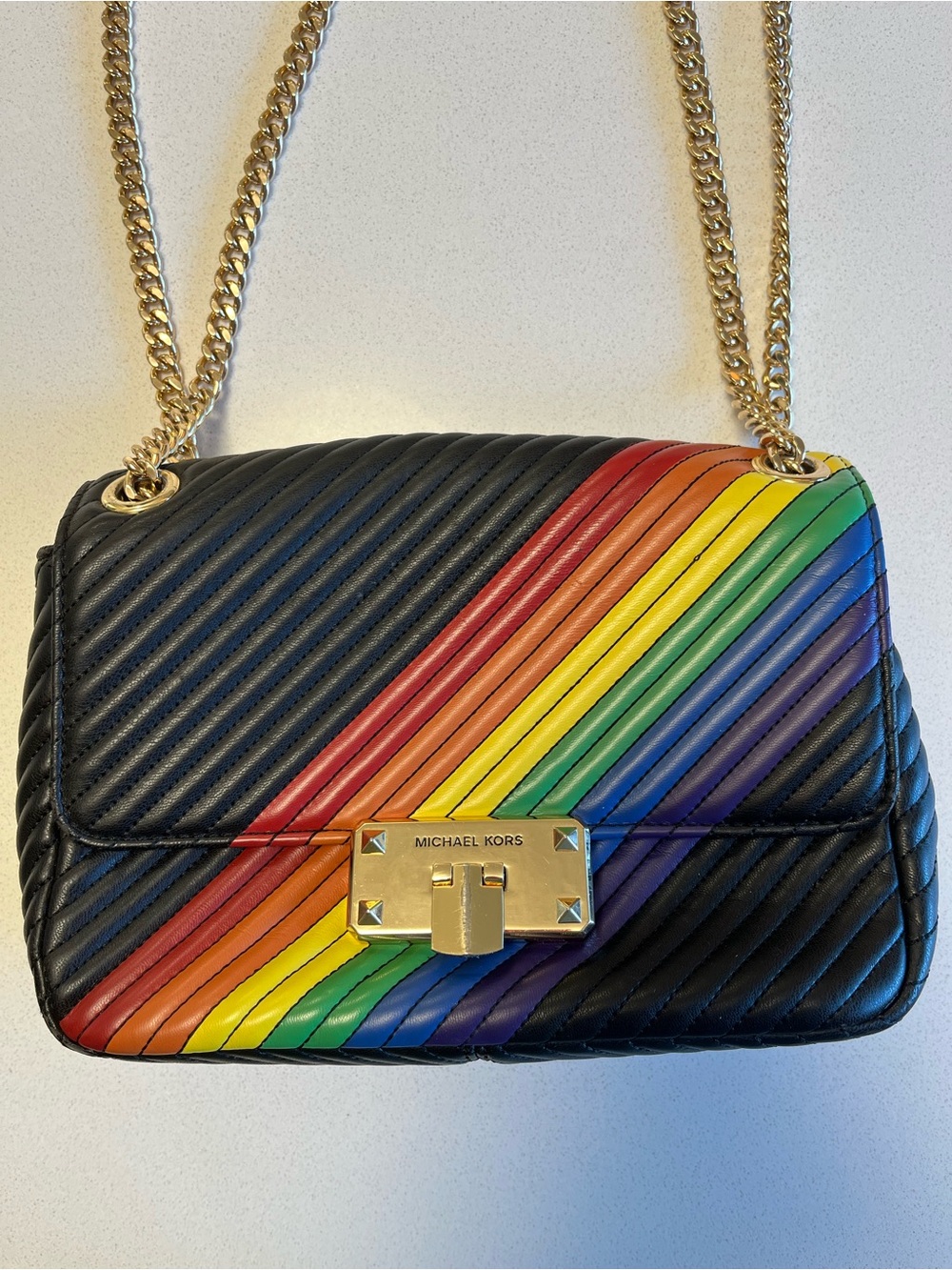 Michael Kors Black Quilted Shoulder Bag with Rainbow Diagonal Stripe